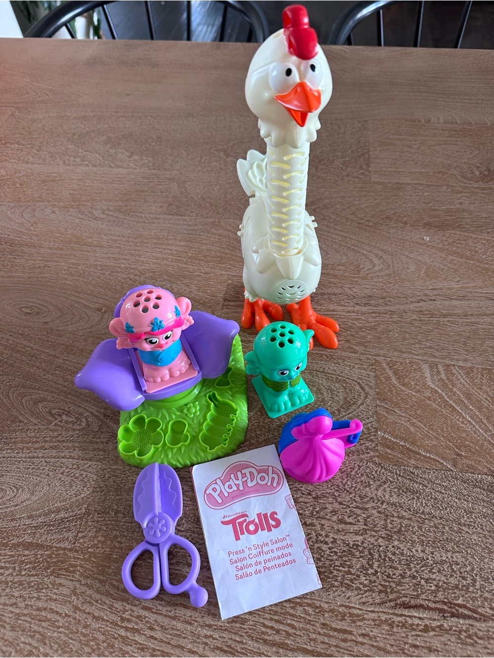 Play-Doh Trolls Hair play set and squawking chicken.